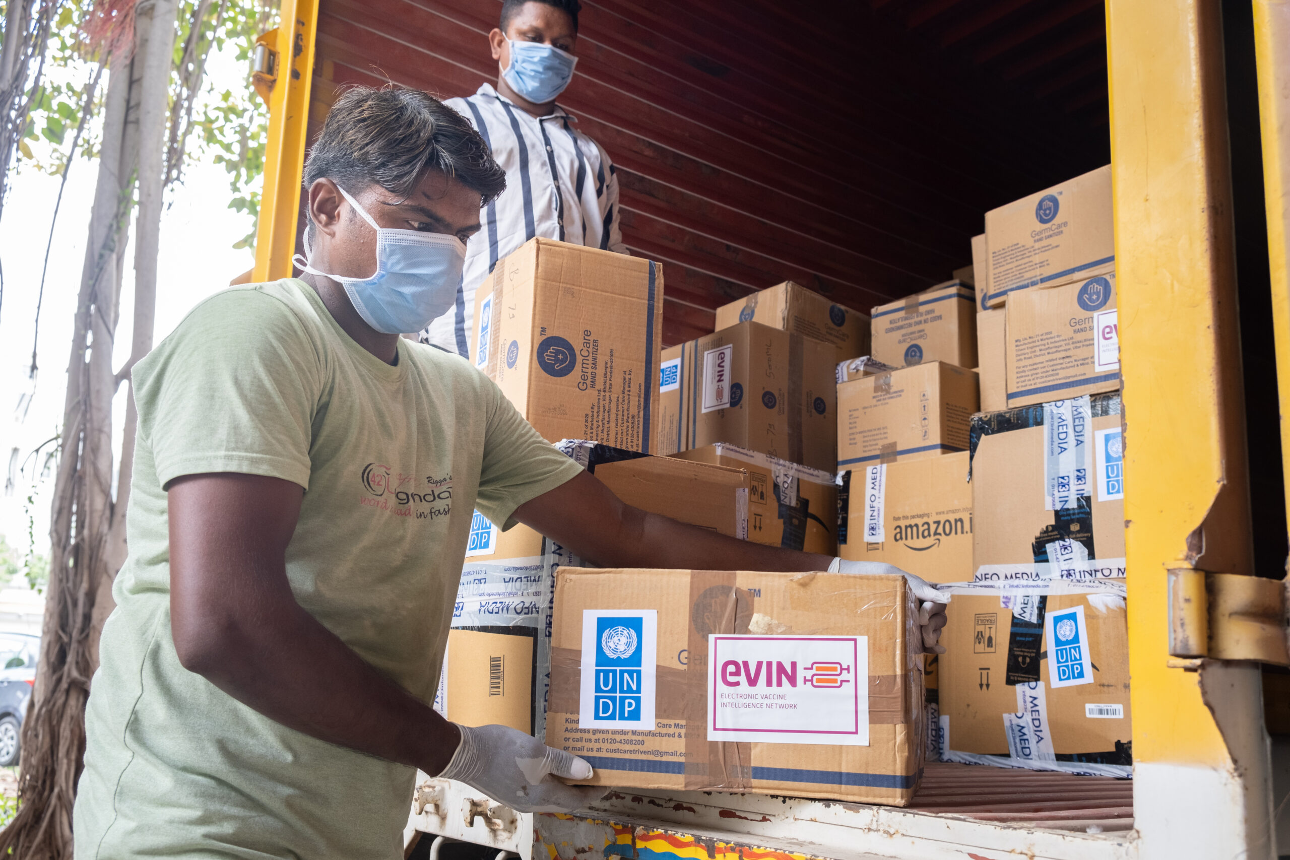 Unloading of covid response material (Gloves , Sanitizers, Masks ) for handing over to Govt of Gujarat. Location : UNDP office, Civil hospital, Gandhinagar, Gujara, India